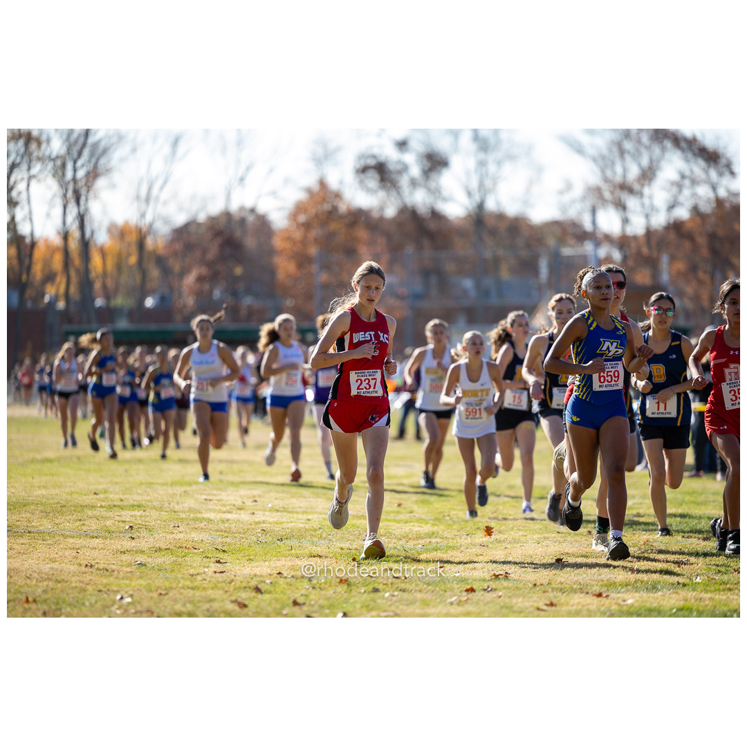 Annelisa Joyce, Cranston West, Zoraya Melendez, North Providence at 2024 RIIL Cross Country Class Championships at Ponaganset High School, North Scituate, Rhode Island on October 26, 2024 title=