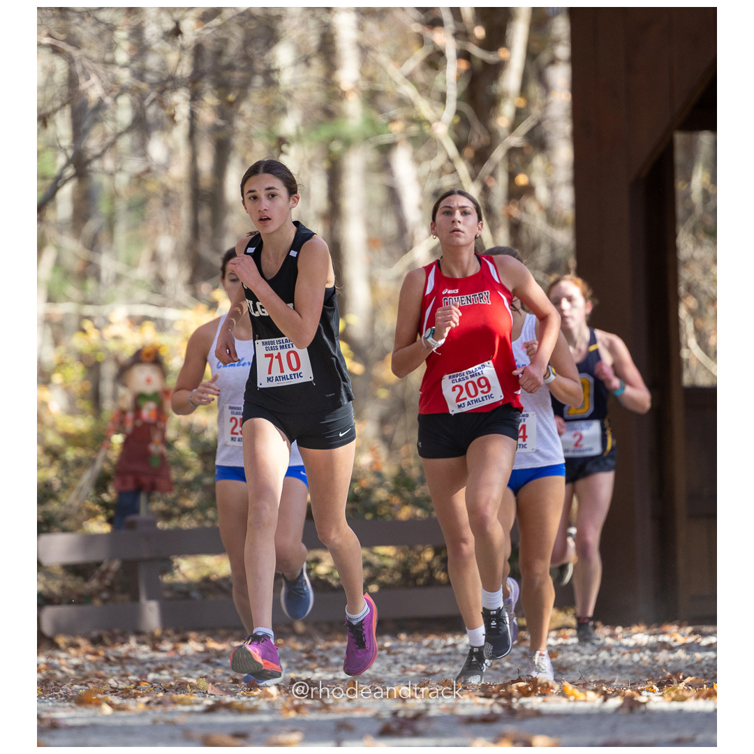 Lia Wasilewski, Pilgrim, Marlee Salvo, Coventry at 2024 RIIL Cross Country Class Championships at Ponaganset High School, North Scituate, Rhode Island on October 26, 2024 title=