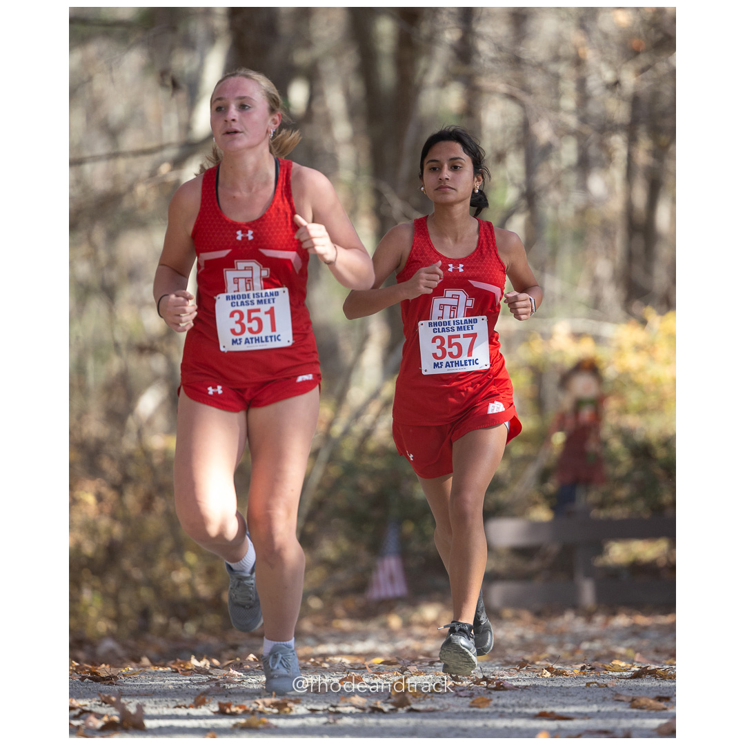 Sadie Gagnon, East Providence, Melany Sotomayor, East Providence at 2024 RIIL Cross Country Class Championships at Ponaganset High School, North Scituate, Rhode Island on October 26, 2024 title=