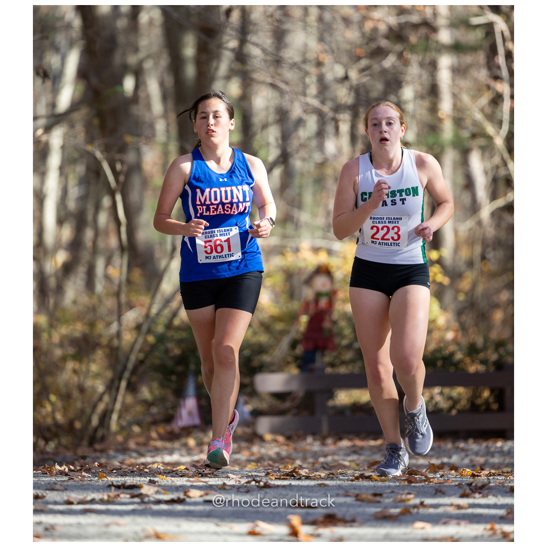 Jennie Mosca, Mount Pleasant, Caroline Brennick, Cranston East at 2024 RIIL Cross Country Class Championships at Ponaganset High School, North Scituate, Rhode Island on October 26, 2024 title=