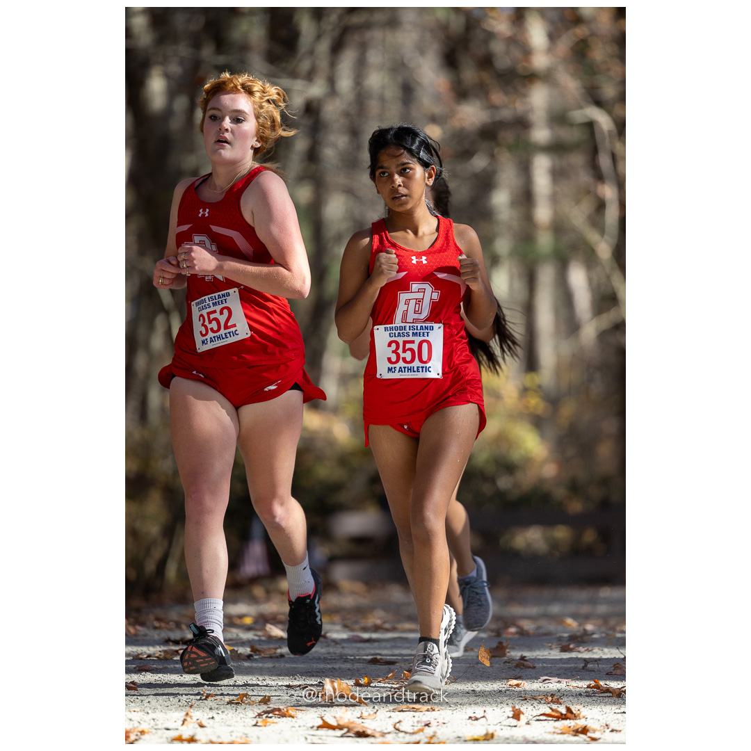Sophie Olive, East Providence, Pooja Ezhilmaran, East Providence at 2024 RIIL Cross Country Class Championships at Ponaganset High School, North Scituate, Rhode Island on October 26, 2024 title=