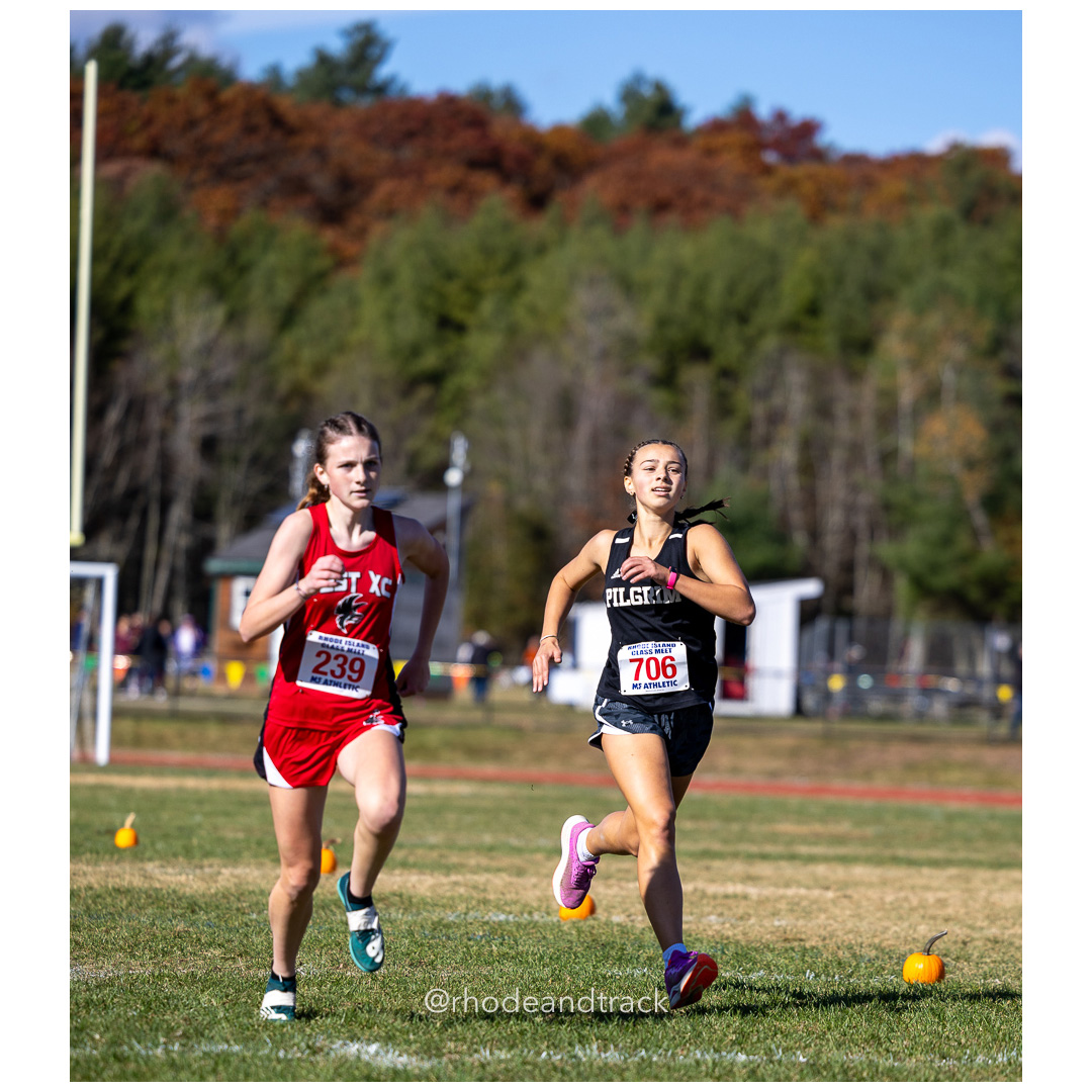 Lilliana Prendergast, Cranston West, Juliana Kavanagh, Pilgrim, at 2024 RIIL Cross Country Class Championships at Ponaganset High School, North Scituate, Rhode Island on October 26, 2024 title=