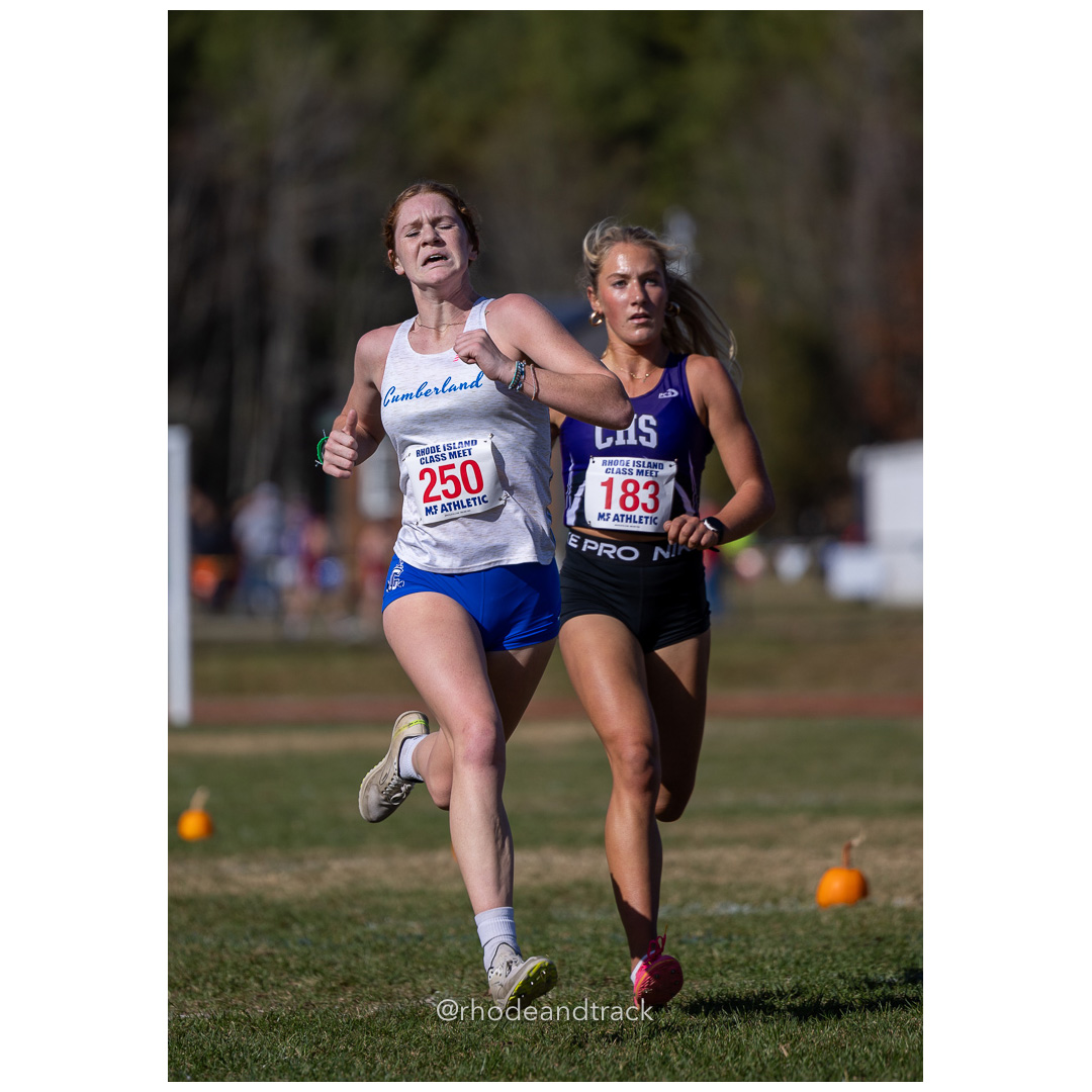 Emily Bourke, Cumberland, Orla Howlett, Classical, at 2024 RIIL Cross Country Class Championships at Ponaganset High School, North Scituate, Rhode Island on October 26, 2024 title=