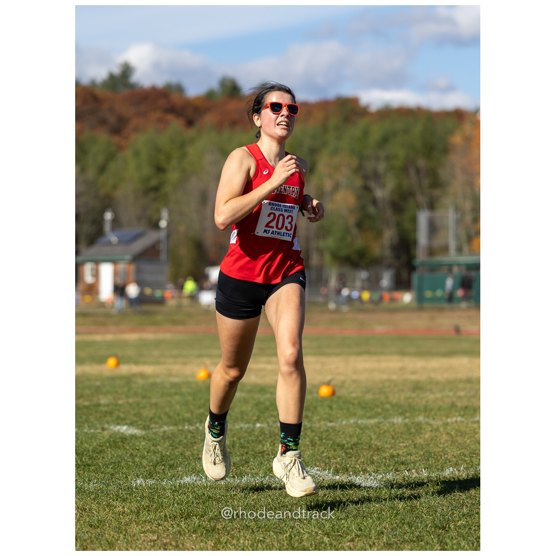 Lilly Anctil, Coventry, at 2024 RIIL Cross Country Class Championships at Ponaganset High School, North Scituate, Rhode Island on October 26, 2024 title=