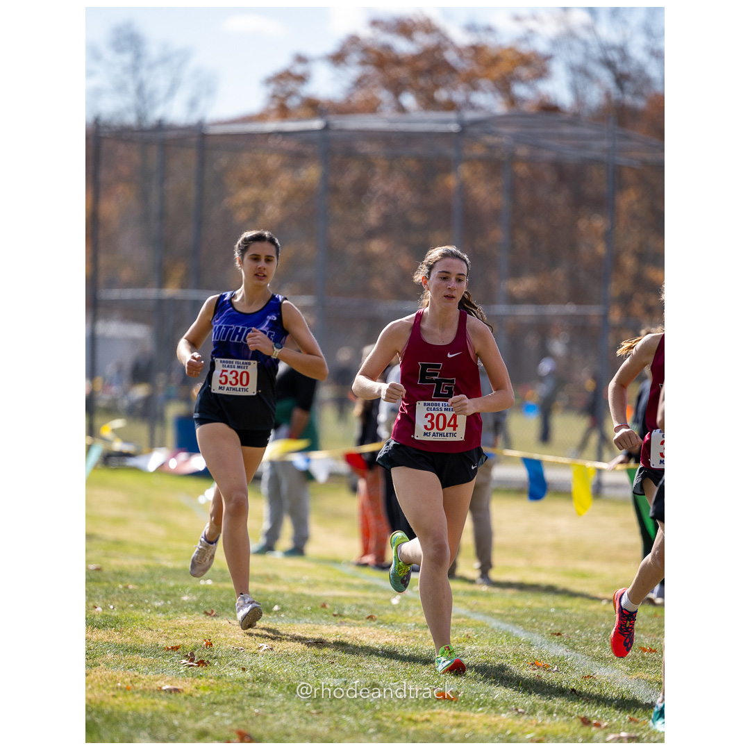 Jessica Deal, Mount Hope, Emily Clarke, East Greenwich, at 2024 RIIL Cross Country Class Championships at Ponaganset High School, North Scituate, Rhode Island on October 26, 2024 title=