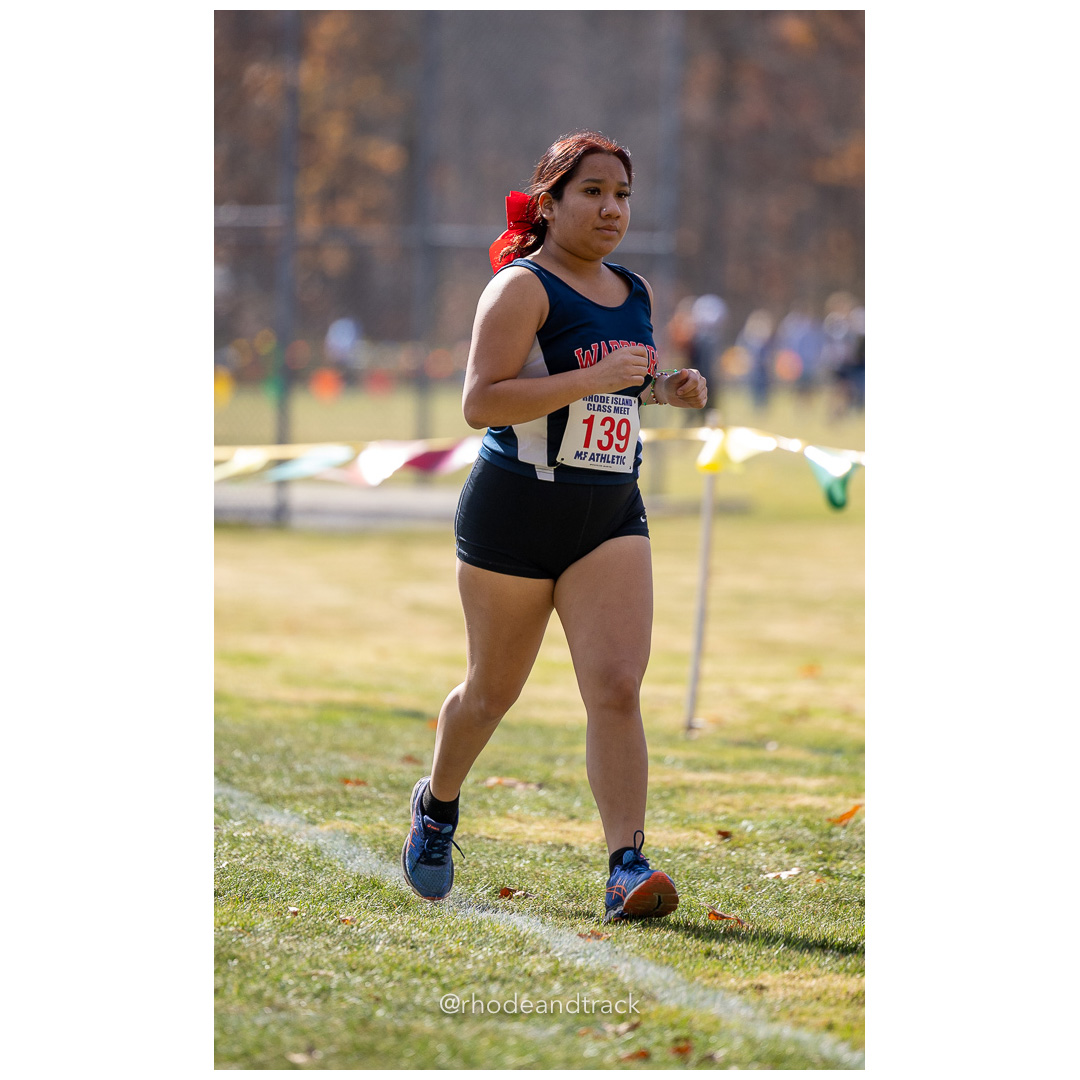 Alejandra Penate, Central Falls, at 2024 RIIL Cross Country Class Championships at Ponaganset High School, North Scituate, Rhode Island on October 26, 2024 title=