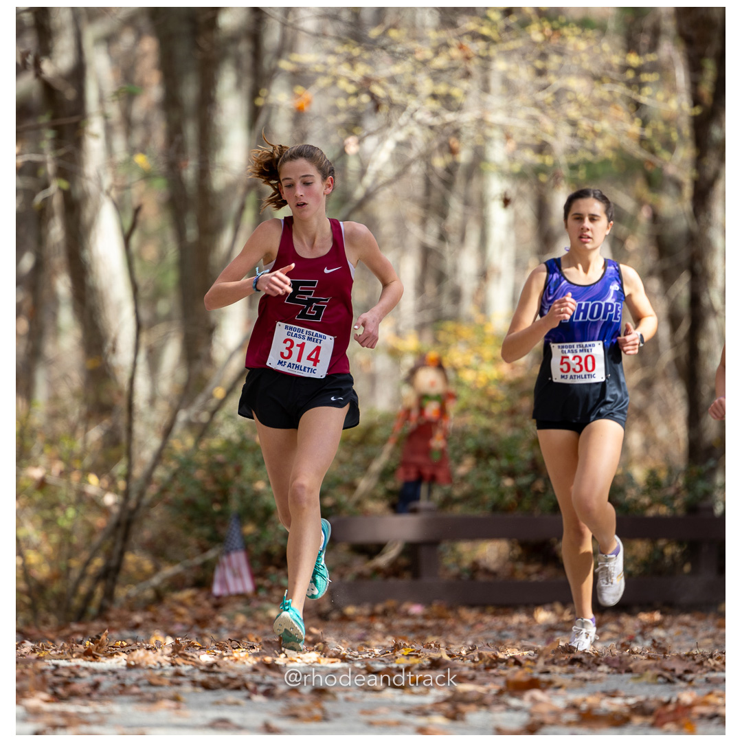Olive Willis, East Greenwich, Jessica Deal, Mount Hope, at 2024 RIIL Cross Country Class Championships at Ponaganset High School, North Scituate, Rhode Island on October 26, 2024 title=