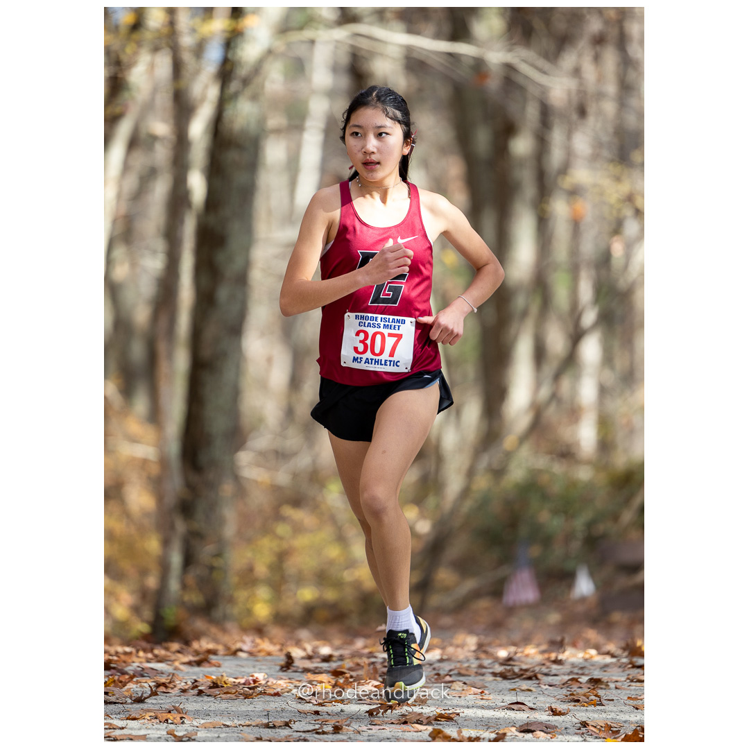 Lindsey Han, East Greenwich, at 2024 RIIL Cross Country Class Championships at Ponaganset High School, North Scituate, Rhode Island on October 26, 2024 title=