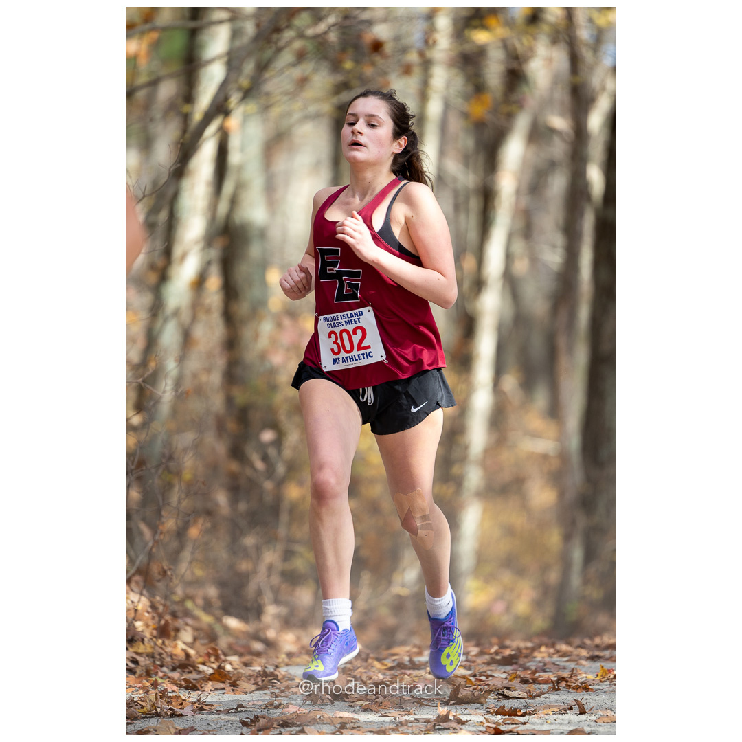 Lily Azzoli, East Greenwich, at 2024 RIIL Cross Country Class Championships at Ponaganset High School, North Scituate, Rhode Island on October 26, 2024 title=