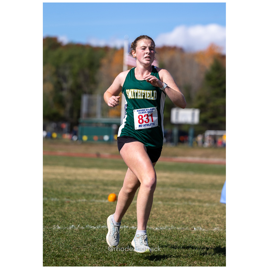 Charlotte Lally, Smithfield, at 2024 RIIL Cross Country Class Championships at Ponaganset High School, North Scituate, Rhode Island on October 26, 2024 title=