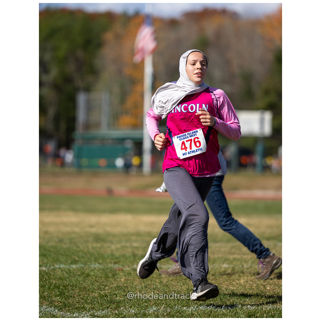 Halima Kouraj, Lincoln, at 2024 RIIL Cross Country Class Championships at Ponaganset High School, North Scituate, Rhode Island on October 26, 2024 title=
