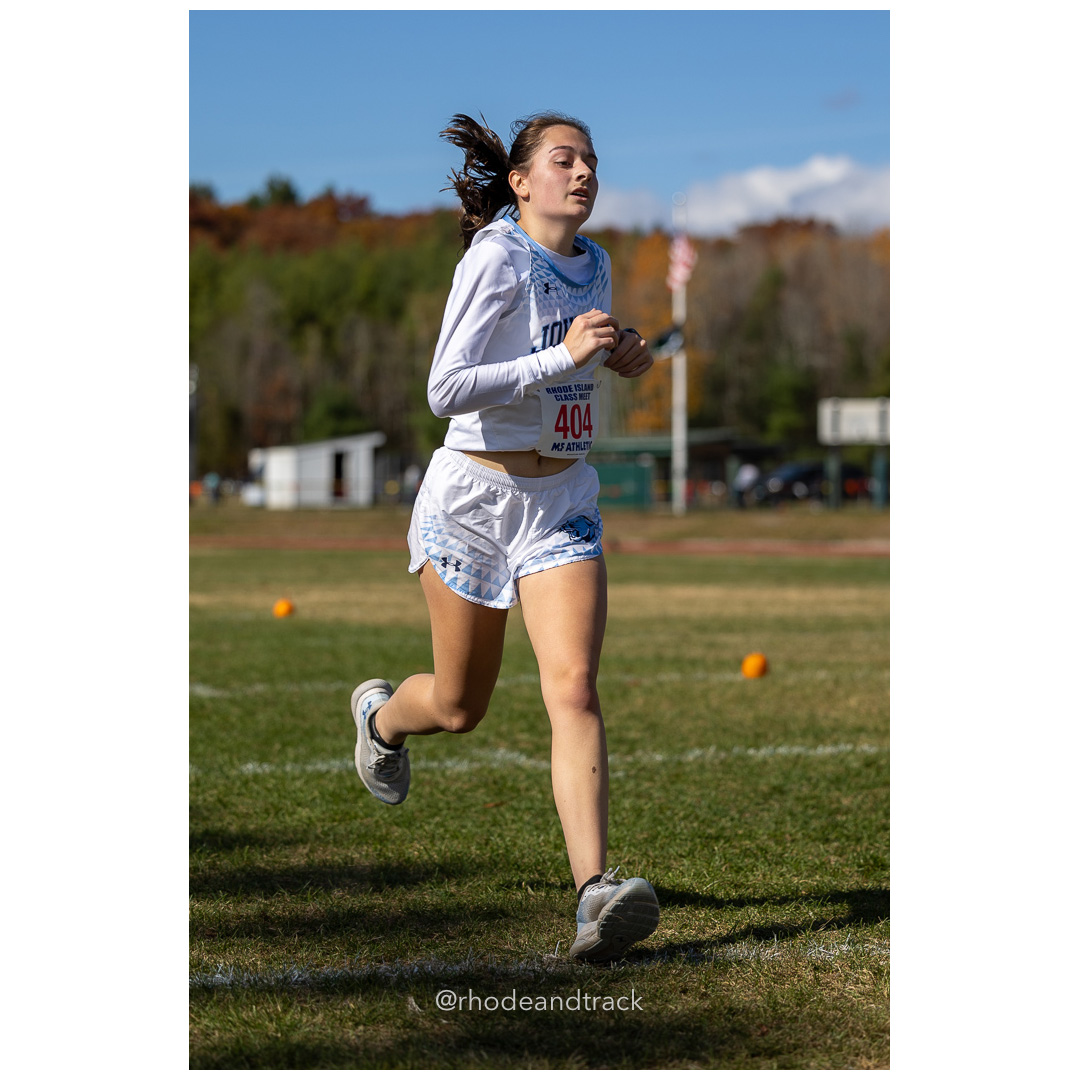 Isabella Halliwell, Johnston, at 2024 RIIL Cross Country Class Championships at Ponaganset High School, North Scituate, Rhode Island on October 26, 2024 title=