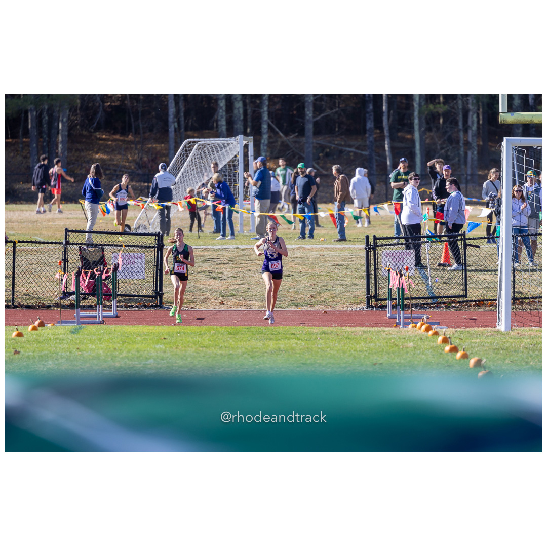 Julia Dowling, North Smithfield, Mackenzie Lickert, St. Raphael, at 2024 RIIL Cross Country Class Championships at Ponaganset High School, North Scituate, Rhode Island on October 26, 2024 title=