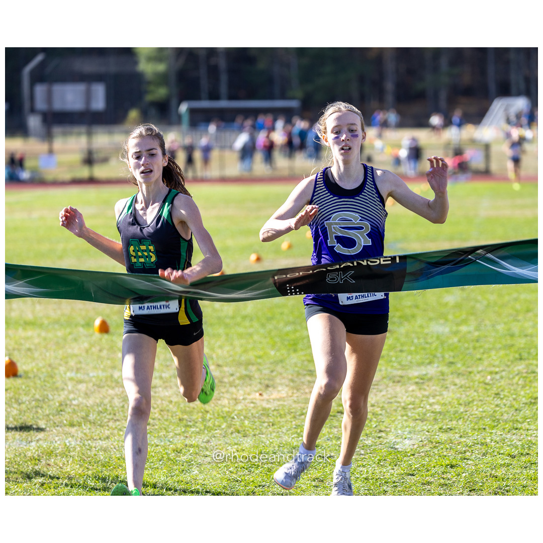 Julia Dowling, North Smithfield, Mackenzie Lickert, St. Raphael, at 2024 RIIL Cross Country Class Championships at Ponaganset High School, North Scituate, Rhode Island on October 26, 2024 title=