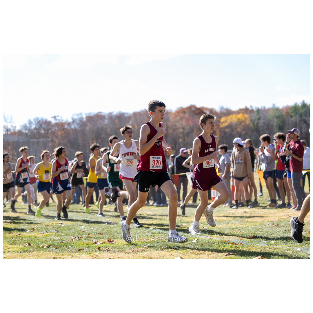 Liam Burke, East Greenwich, Nick Scotti, La Salle, at 2024 RIIL Cross Country Class Championships at Ponaganset High School, North Scituate, Rhode Island on October 26, 2024 title=