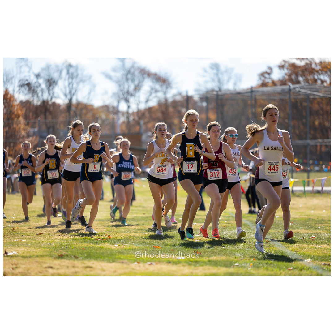 Maeve Kelly, Barrington, at 2024 RIIL Cross Country Class Championships at Ponaganset High School, North Scituate, Rhode Island on October 26, 2024 title=