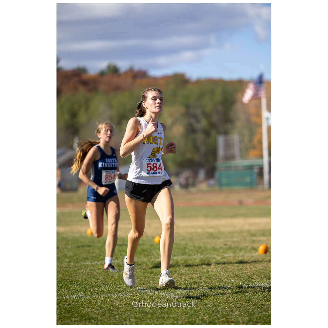 Hannah Duva, North Kingstown, at 2024 RIIL Cross Country Class Championships at Ponaganset High School, North Scituate, Rhode Island on October 26, 2024 title=