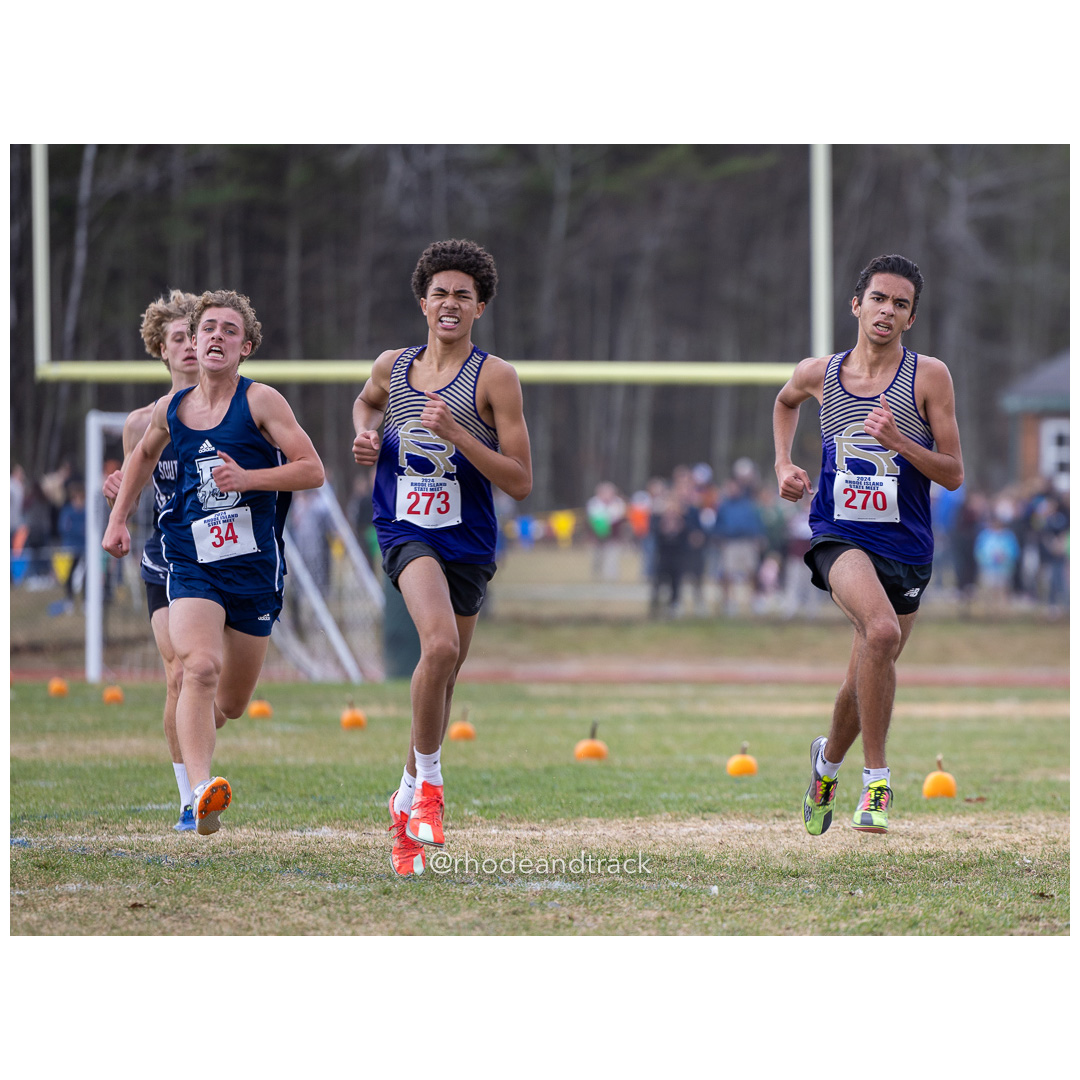 Dylan Kafalas, Burrilville, GR 9 - Elias Wilson, St. Raphael Academy, GR 11 - Alejandro Rivera, St. Raphael Academy, GR 12 - 2024 RIIL Cross Country RI State Championship at Ponaganset High School, North Scituate, Rhode Island on November 2, 2024 File: ./dir-boys/241102-241102-2024-RI-Cross-Country-State-Championsips-Ponaganset-268-062A4064.jpg Dylan Kafalas, Burrilville, GR 9 - Elias Wilson, St. Raphael Academy, GR 11 - Alejandro Rivera, St. Raphael Academy, GR 12 - 2024 RIIL Cros…