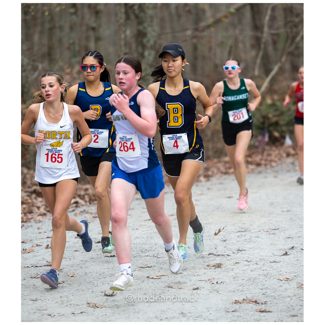 Riley Morrison, North Kingstown High School, GR 9 - Caitlin Pierce, St Mary Academy-Bay View, GR 9 - Indie Lamb, Barrington High School, GR 12 - 2024 RIIL Cross Country RI State Championship at Ponaganset High School, North Scituate, Rhode Island on November 2, 2024 File: ./dir-girls/241102-241102-2024-RI-Cross-Country-State-Championsips-Ponaganset-390-062A5374.jpg Riley Morrison, North Kingstown High School, GR 9 - Caitlin Pierce, St Mary Academy-Bay View, GR 9 - Indie Lamb, Barrington High School, GR…