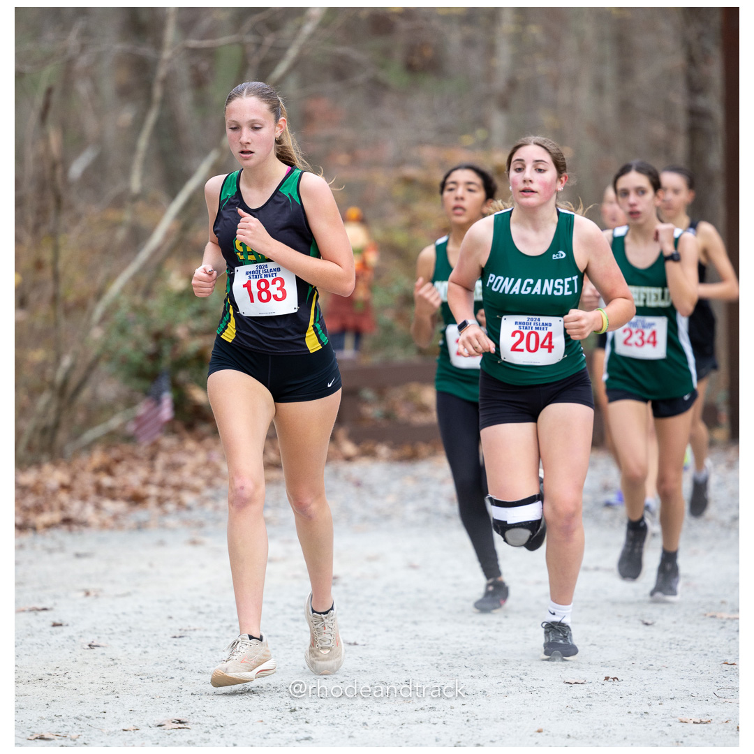 Mya Silveria, North Smithfield High School, GR 12 - Ava Palys, Ponaganset High School, GR 9 - 2024 RIIL Cross Country RI State Championship at Ponaganset High School, North Scituate, Rhode Island on November 2, 2024 File: ./dir-girls/241102-241102-2024-RI-Cross-Country-State-Championsips-Ponaganset-411-062A5602.jpg Mya Silveria, North Smithfield High School, GR 12 - Ava Palys, Ponaganset High School, GR 9 - 2024 RIIL Cross Country RI State Championship…