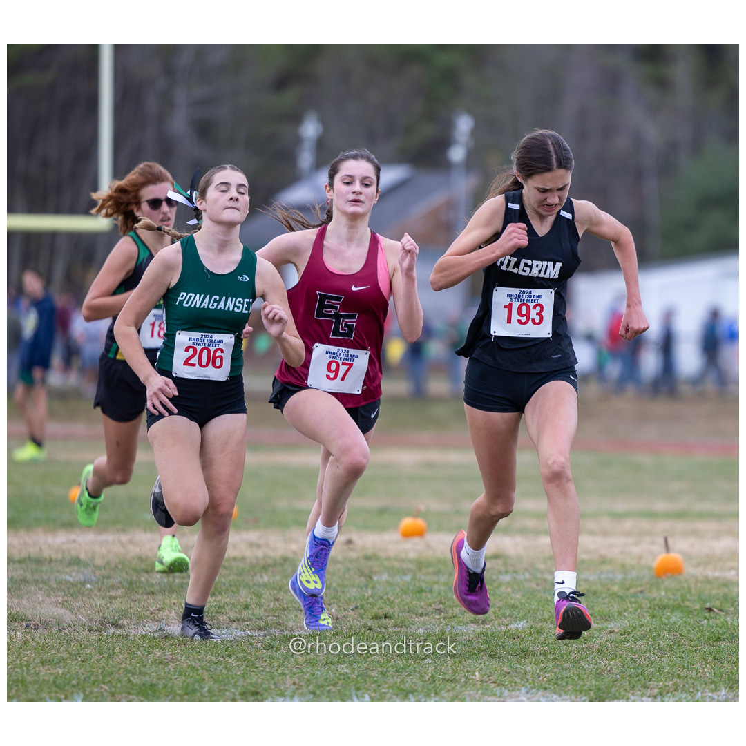 Riley Shields, Ponaganset High School, GR 9 - Lily Azzoli, East Greenwich High School, GR 11 - Lia Wasilewski, Pilgrim High School, GR 10 - 2024 RIIL Cross Country RI State Championship at Ponaganset High School, North Scituate, Rhode Island on November 2, 2024 File: ./dir-girls/241102-241102-2024-RI-Cross-Country-State-Championsips-Ponaganset-494-062A7377.jpg Riley Shields, Ponaganset High School, GR 9 - Lily Azzoli, East Greenwich High School, GR 11 - Lia Wasilewski, Pilgrim High School, GR 10 -…