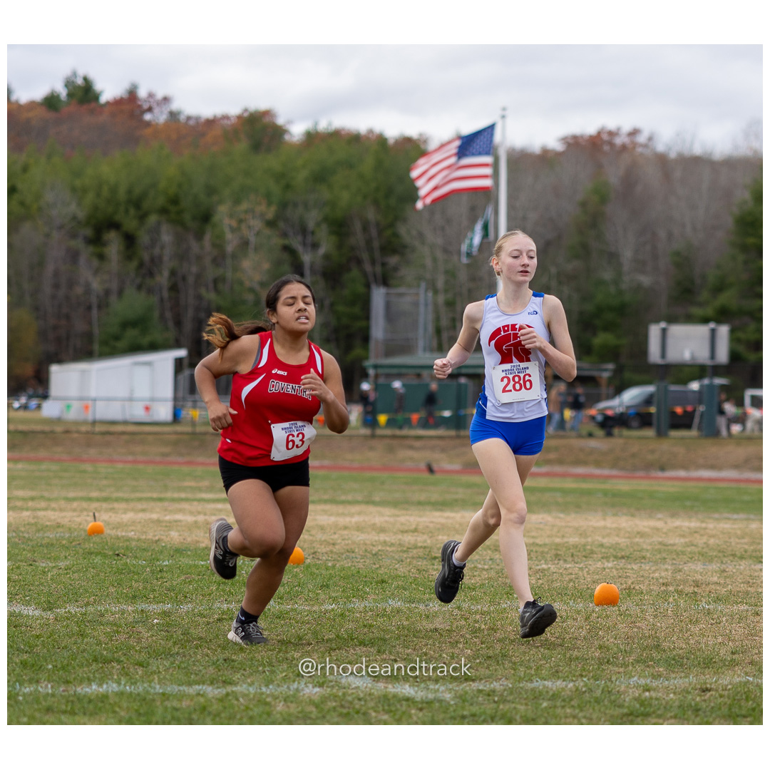 Isabella Sipaque, Coventry High School, GR 12 - Myana O'Brien, Toll Gate High School, GR 11 - 2024 RIIL Cross Country RI State Championship at Ponaganset High School, North Scituate, Rhode Island on November 2, 2024 File: ./dir-girls/241102-241102-2024-RI-Cross-Country-State-Championsips-Ponaganset-577-062A9058.jpg Isabella Sipaque, Coventry High School, GR 12 - Myana O'Brien, Toll Gate High School, GR 11 - 2024 RIIL Cross Country RI State Championship…