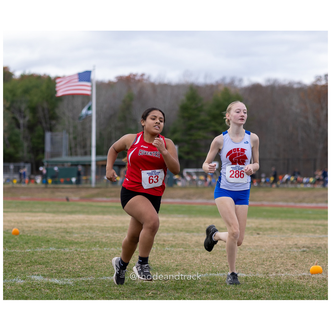 Isabella Sipaque, Coventry High School, GR 12 - Myana O'Brien, Toll Gate High School, GR 11 - 2024 RIIL Cross Country RI State Championship at Ponaganset High School, North Scituate, Rhode Island on November 2, 2024 File: ./dir-girls/241102-241102-2024-RI-Cross-Country-State-Championsips-Ponaganset-578-062A9063.jpg Isabella Sipaque, Coventry High School, GR 12 - Myana O'Brien, Toll Gate High School, GR 11 - 2024 RIIL Cross Country RI State Championship…