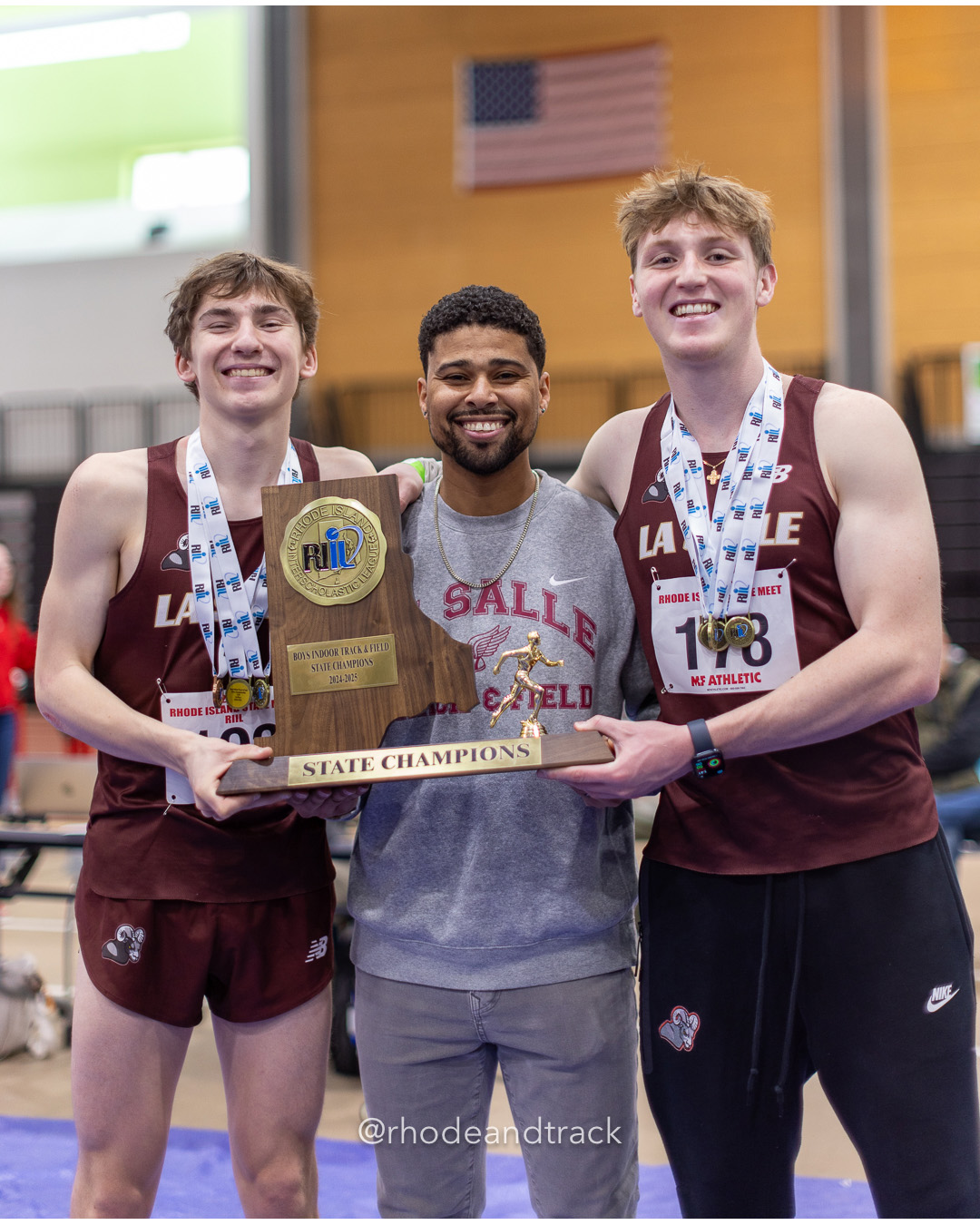 Marshall Vernon, Coach Eldon Santiago, Garrett Giroux-Pezzullo - La Salle Academy - Team Champions - RI 2025 Indoor Track and Field State Championships - PCTA - Providence RI - February 15 2025 File: ./dir-1-Boys-State-Championship/250215-track-indoor-2025-ri-state-championship-pcta-700-_U1A2062.jpg Marshall Vernon, Coach Eldon Santiago, Garrett Giroux-Pezzullo - La Salle Academy - Team Champions - RI 2025 Indoor Track and Field State C…