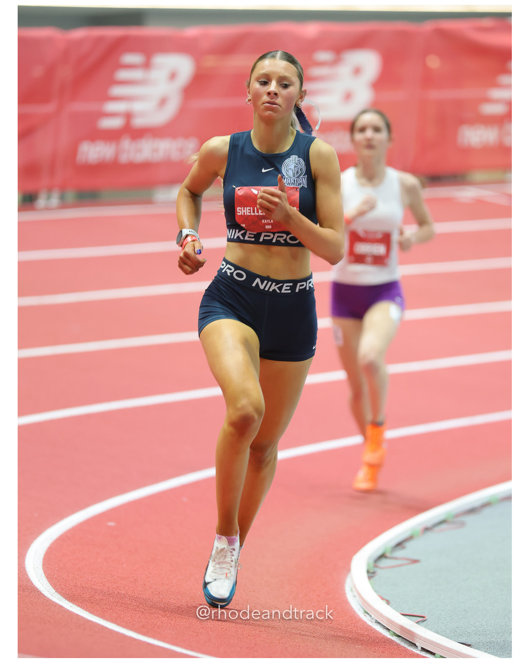 Kayla Shellenbarger, Martian Elite, Girls Freshman Mile, New Balance Indoor Nationals - the TRACK at New Balance - Boston MA File: ./dir-1-Girls-Freshman-Mile/250313-NBIN-2025-Thursday-92-296A9628.jpg Kayla Shellenbarger, Martian Elite, Girls Freshman Mile, New Balance Indoor Nationals - the TRACK at New Balance - Boston MA – New Balance…