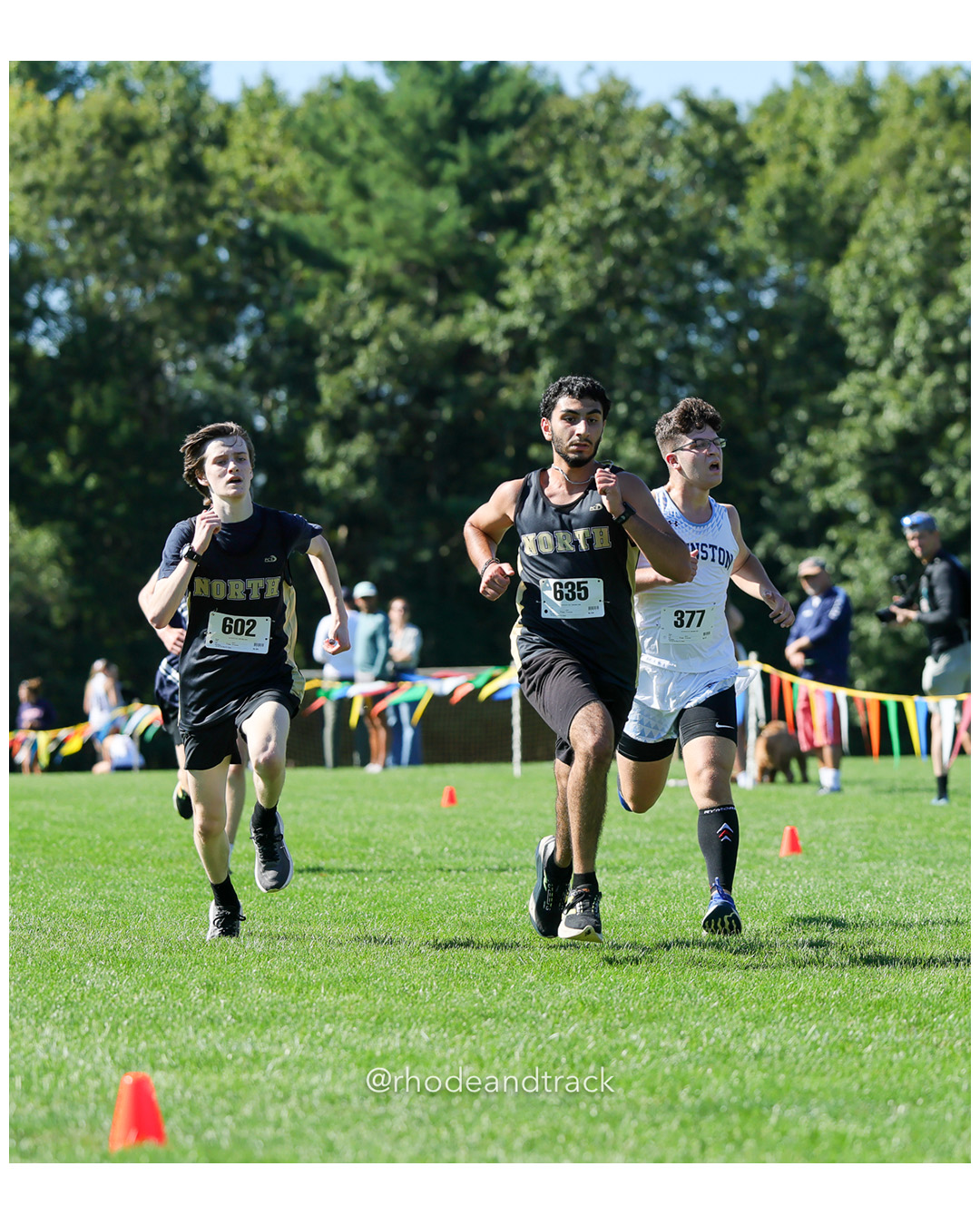 Caleb Enser - North Kingstown High School - 21:46.89 - Haider Rahim - North Kingstown High School - 21:47.19 - Ryan Capraro - Johnston High School - 21:48.20 - 2025 Injury Fund Carnival XC Cross Country Race - Deerfield Park, Smithfield RI - August 30 2025 File: ./dir-2-Boys-Danny-Brennan-Race/250830-2025-ritca-injury-fund-xc-cross-country-deerfield-park-smithfield-rhode-island-204-296A1476.jpg Caleb Enser - North Kingstown High School - 21:46.89 - Haider Rahim - North Kingstown High School - 21:47.19 - Ryan Capraro - Johnston High…