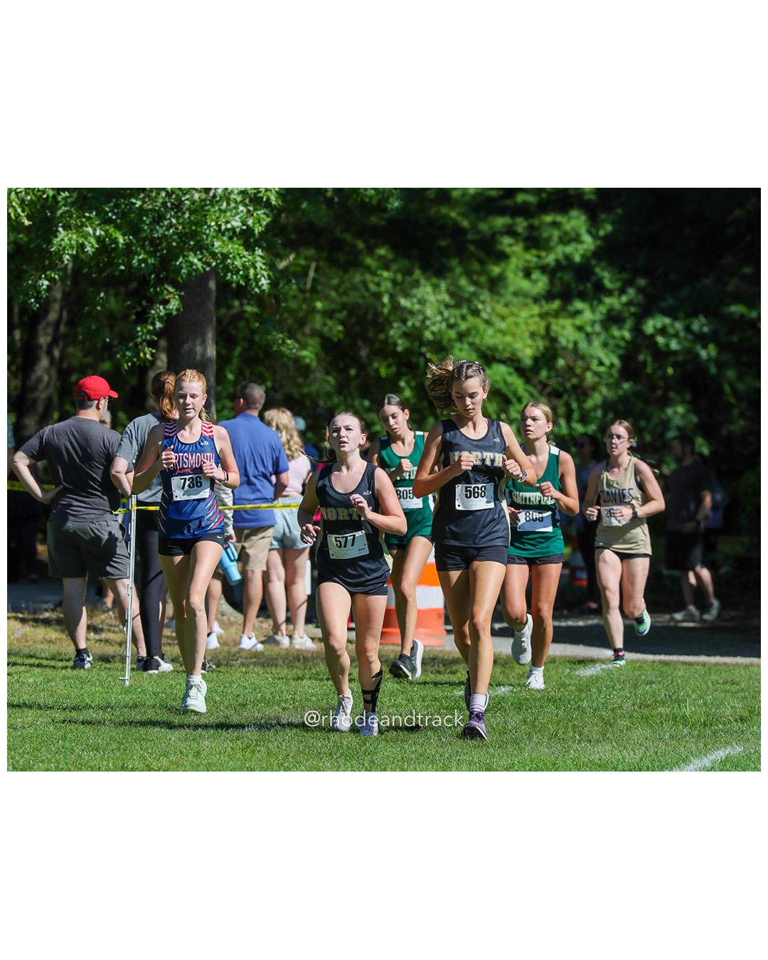 Anneliese Halvorsen - Portsmouth High School - 25:06.76 - Leena Neri - North Kingstown High School - 25:04.06 - Ruby Galle - North Kingstown High School - 25:02.78 - 2025 Injury Fund Carnival XC Cross Country Race - Deerfield Park, Smithfield RI - August 30 2025 File: ./dir-3-Girls-Roger-Roy-Race/250830-2025-ritca-injury-fund-xc-cross-country-deerfield-park-smithfield-rhode-island-269-296A3485.jpg Anneliese Halvorsen - Portsmouth High School - 25:06.76 - Leena Neri - North Kingstown High School - 25:04.06 - Ruby Galle - North Kingstow…