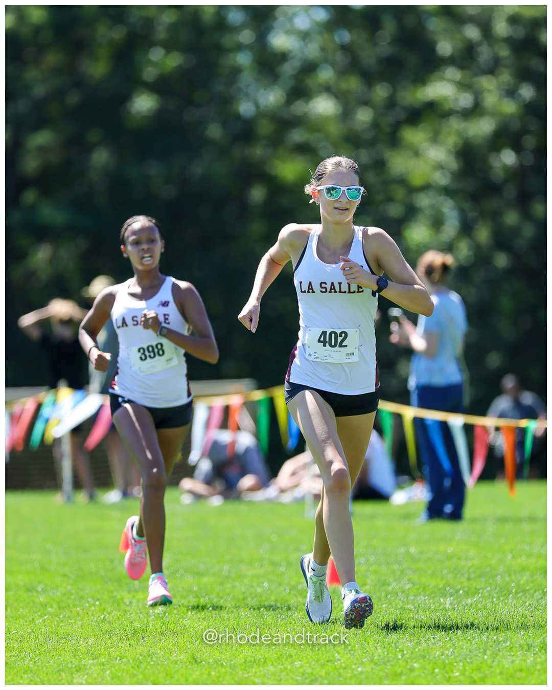 Kenya Depina - La Salle Academy - 21:08.83 - Gemma Kent - La Salle Academy - 21:08.00 - 2025 Injury Fund Carnival XC Cross Country Race - Deerfield Park, Smithfield RI - August 30 2025 File: ./dir-7-Girls-Jane-Hindley-Race/250830-2025-ritca-injury-fund-xc-cross-country-deerfield-park-smithfield-rhode-island-853-296A7491.jpg Kenya Depina - La Salle Academy - 21:08.83 - Gemma Kent - La Salle Academy - 21:08.00 - 2025 Injury Fund Carnival XC Cross Country Race - D…