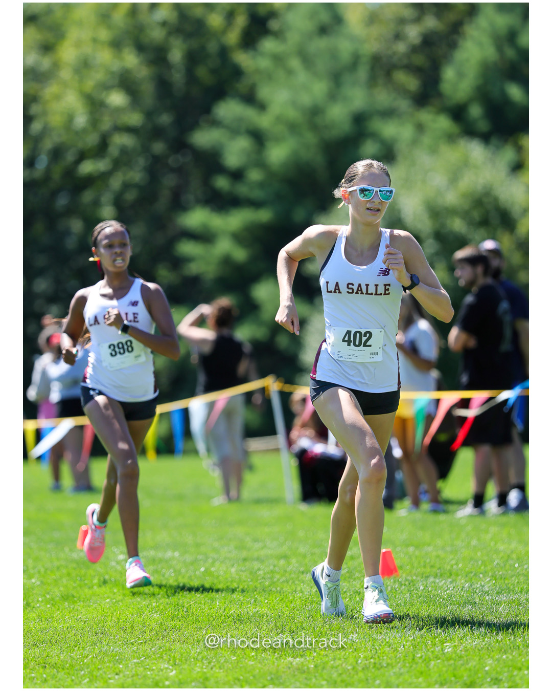 Kenya Depina - La Salle Academy - 21:08.83 - Gemma Kent - La Salle Academy - 21:08.00 - 2025 Injury Fund Carnival XC Cross Country Race - Deerfield Park, Smithfield RI - August 30 2025 File: ./dir-7-Girls-Jane-Hindley-Race/250830-2025-ritca-injury-fund-xc-cross-country-deerfield-park-smithfield-rhode-island-854-296A7516.jpg Kenya Depina - La Salle Academy - 21:08.83 - Gemma Kent - La Salle Academy - 21:08.00 - 2025 Injury Fund Carnival XC Cross Country Race - D…
