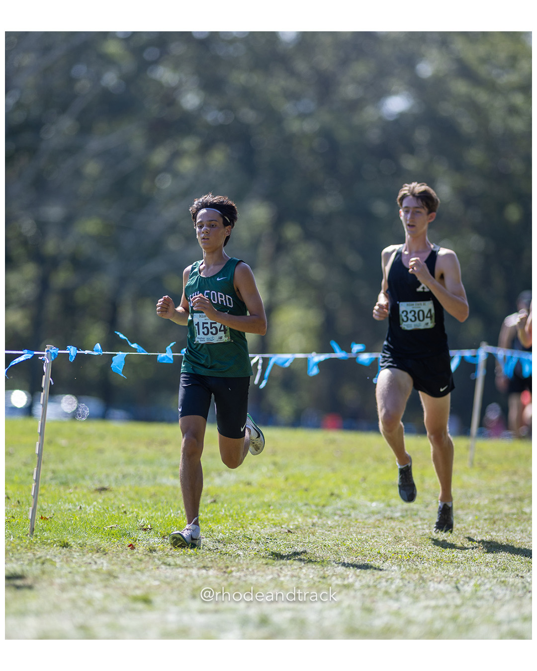 Jordan Espinosa – Guilford High School - Andrew Hawk – Xavier High School - 2025 RI Ocean State XC Invitational - Goddard Memorial Park - Warwick, RI - September 27 2025 File: ./250927-2025-ocean-state-xc-invitational-warwick-ri-102-062A2349.jpg Jordan Espinosa – Guilford High School - Andrew Hawk – Xavier High School - 2025 RI Ocean State XC Invitational - Goddard Memorial Park - W…