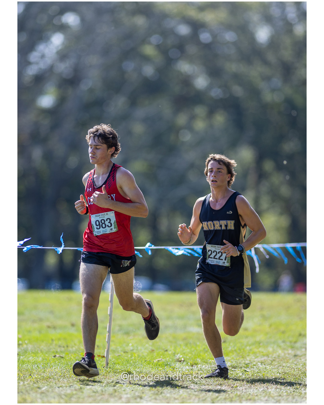 Declan McConkey – Coventry High School - Xavier Baker – North Kingstown High School - 2025 RI Ocean State XC Invitational - Goddard Memorial Park - Warwick, RI - September 27 2025 File: ./250927-2025-ocean-state-xc-invitational-warwick-ri-135-062A2496.jpg Declan McConkey – Coventry High School - Xavier Baker – North Kingstown High School - 2025 RI Ocean State XC Invitational - Goddard Memoria…