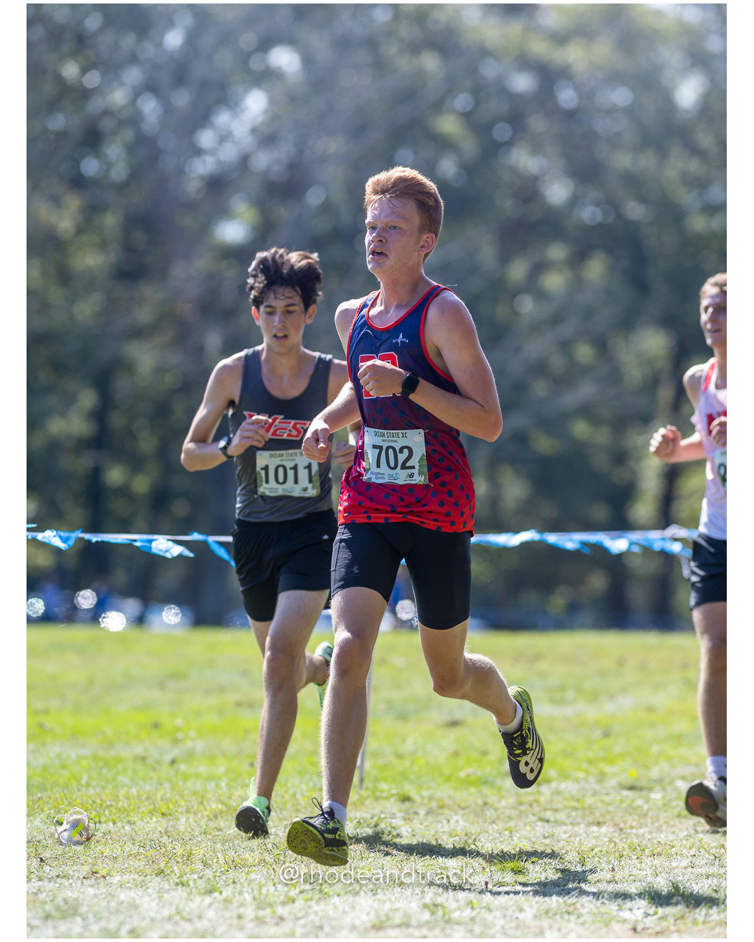 Anden Bianchi – Cranston West High School - Colin Hourihan – Bridgewater Raynham Regional High School - 2025 RI Ocean State XC Invitational - Goddard Memorial Park - Warwick, RI - September 27 2025 File: ./250927-2025-ocean-state-xc-invitational-warwick-ri-155-062A2576.jpg Anden Bianchi – Cranston West High School - Colin Hourihan – Bridgewater Raynham Regional High School - 2025 RI Ocean State XC Invitational…