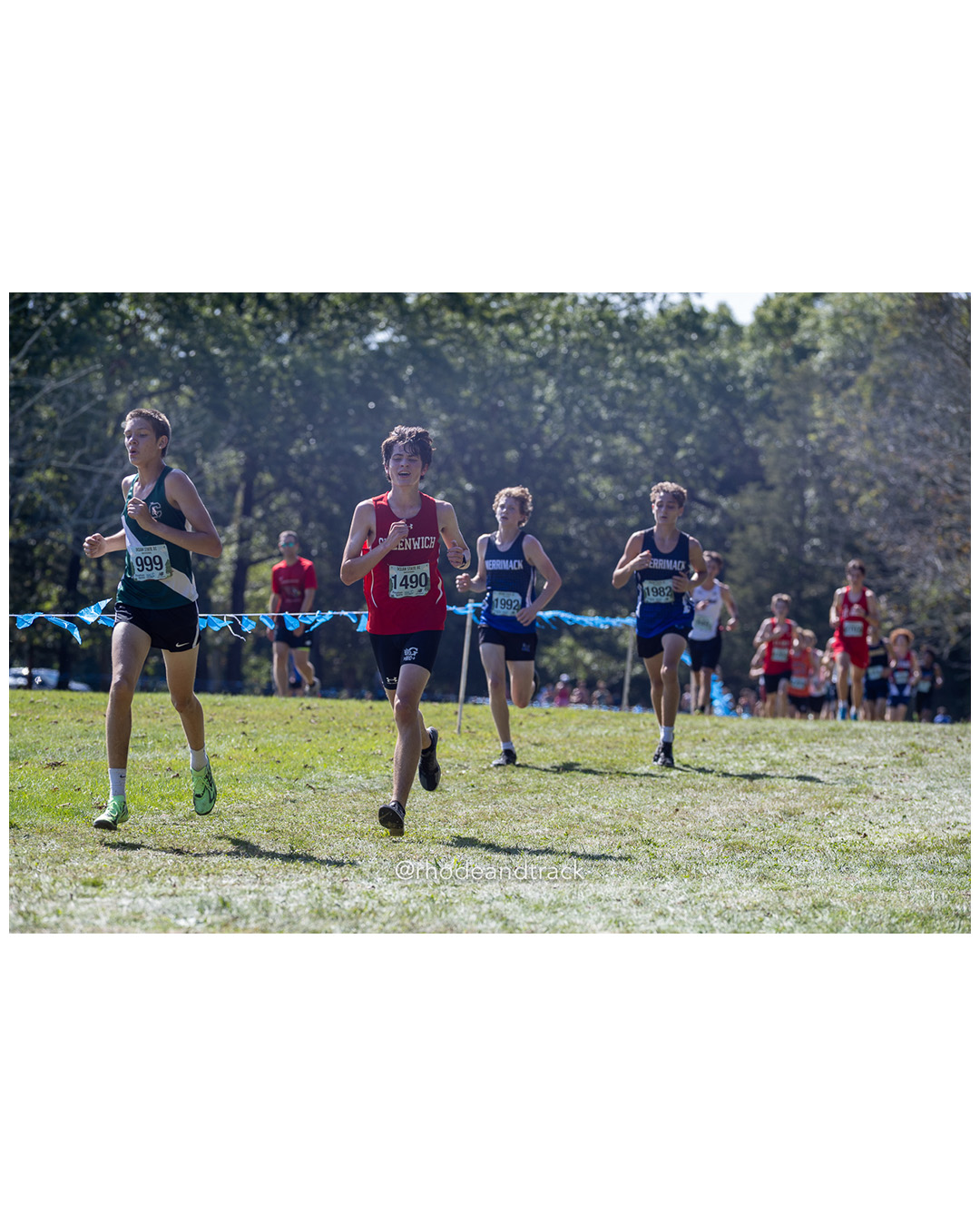 Jaiden Ferrara – Cranston East High School - Jack Broderick – Greenwich High School - 2025 RI Ocean State XC Invitational - Goddard Memorial Park - Warwick, RI - September 27 2025 File: ./250927-2025-ocean-state-xc-invitational-warwick-ri-180-062A2703.jpg Jaiden Ferrara – Cranston East High School - Jack Broderick – Greenwich High School - 2025 RI Ocean State XC Invitational - Goddard Memoria…