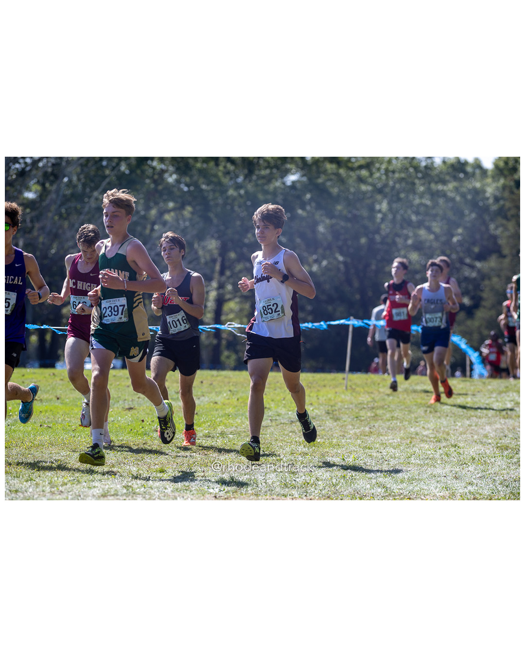 Brendan Schnepf – Notre Dame-West Haven - Nate Dorrance – Cranston West High School - Clake Panton – Chelmsford High School - 2025 RI Ocean State XC Invitational - Goddard Memorial Park - Warwick, RI - September 27 2025 File: ./250927-2025-ocean-state-xc-invitational-warwick-ri-196-062A2775.jpg Brendan Schnepf – Notre Dame-West Haven - Nate Dorrance – Cranston West High School - Clake Panton – Chelmsford High School - 2025 RI Ocean…