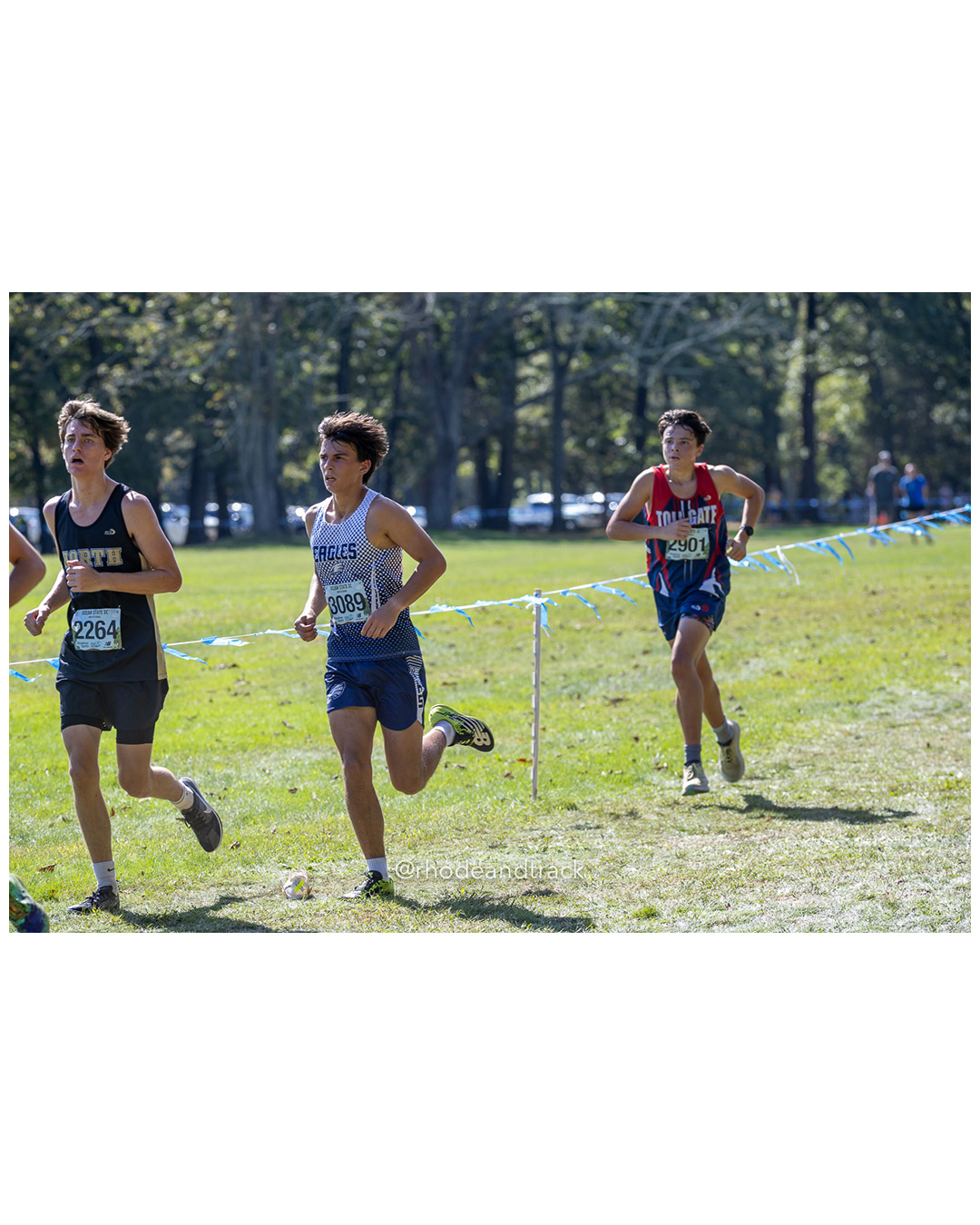 Thomas Lawrence – North Kingstown High School - Owen Redfield – Wether Sfield High School - Jacob Balbuena – Toll Gate High School - 2025 RI Ocean State XC Invitational - Goddard Memorial Park - Warwick, RI - September 27 2025 File: ./250927-2025-ocean-state-xc-invitational-warwick-ri-210-062A2840.jpg Thomas Lawrence – North Kingstown High School - Owen Redfield – Wether Sfield High School - Jacob Balbuena – Toll Gate High School - 2025 R…