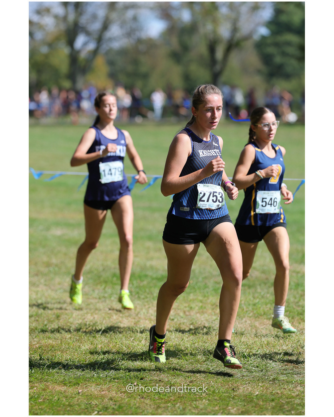 Stella Nappa – Franklin High School - Katherine Cavanaugh – Southington High School - Evelyn Lefort – Barrington High School - 2025 RI Ocean State XC Invitational - Goddard Memorial Park - Warwick, RI - September 27 2025 File: ./250927-2025-ocean-state-xc-invitational-warwick-ri-241-296A6334.jpg Stella Nappa – Franklin High School - Katherine Cavanaugh – Southington High School - Evelyn Lefort – Barrington High School - 2025 RI Ocea…