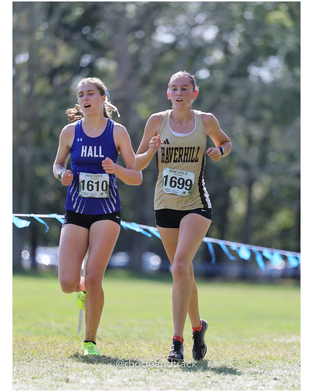 Lucille Vargas – Hall High School - Emmalyn Proia – Haverhill High School - 2025 RI Ocean State XC Invitational - Goddard Memorial Park - Warwick, RI - September 27 2025 File: ./250927-2025-ocean-state-xc-invitational-warwick-ri-281-296A7458.jpg Lucille Vargas – Hall High School - Emmalyn Proia – Haverhill High School - 2025 RI Ocean State XC Invitational - Goddard Memorial Park - W…