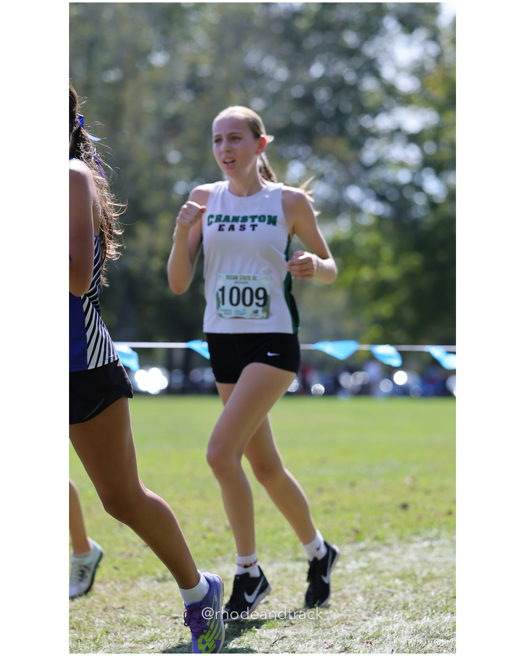 Winnie White – Cranston East High School - 2025 RI Ocean State XC Invitational - Goddard Memorial Park - Warwick, RI - September 27 2025 File: ./250927-2025-ocean-state-xc-invitational-warwick-ri-299-296A7796.jpg Winnie White – Cranston East High School - 2025 RI Ocean State XC Invitational - Goddard Memorial Park - Warwick, RI - September 27 2025 –…