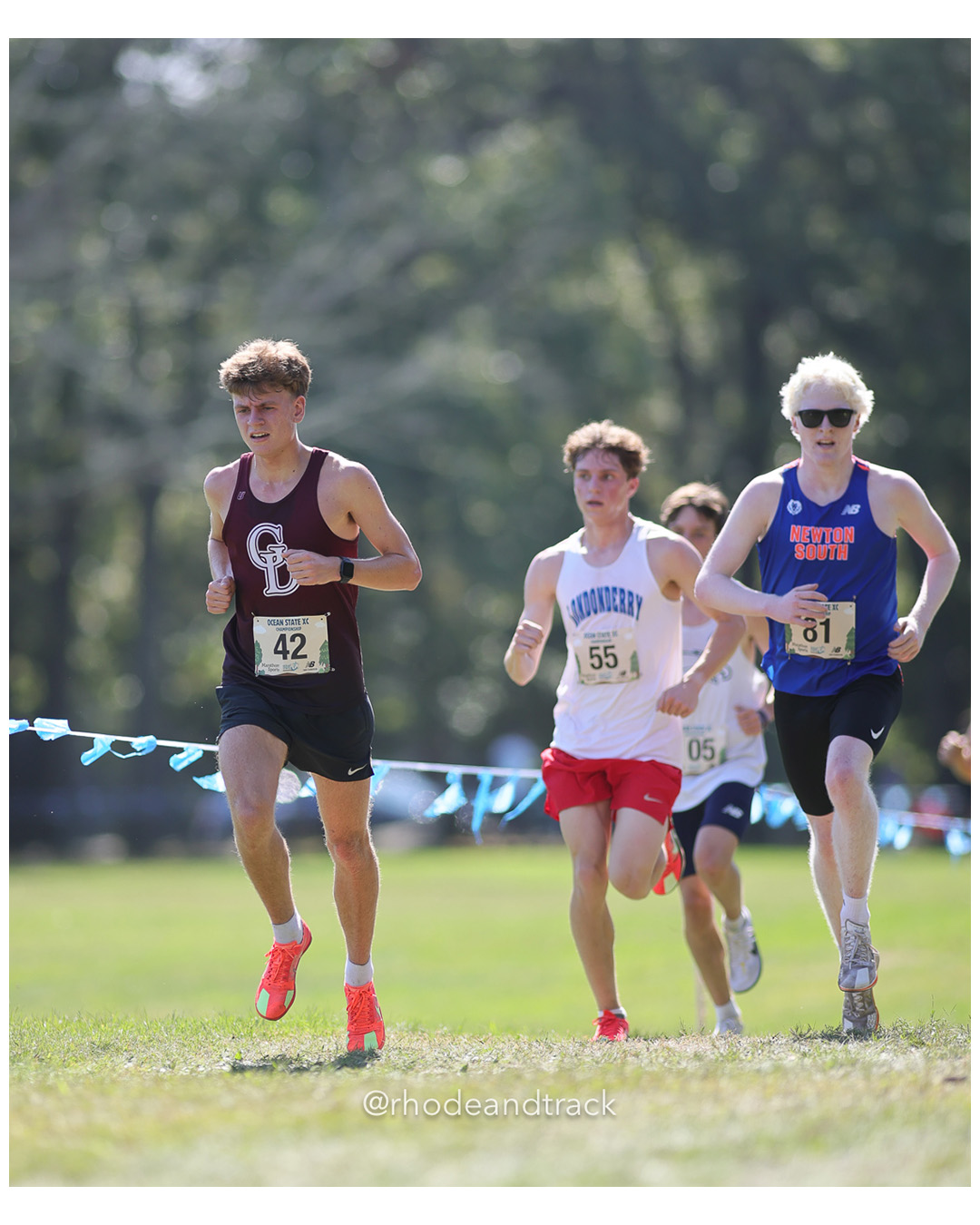 Greyson Duane – Groton Dunstable Regional High S - Jack Dibuono – Londonderry High School - Gavin Macdonald – Newton South High School - 2025 RI Ocean State XC Invitational - Goddard Memorial Park - Warwick, RI - September 27 2025 File: ./250927-2025-ocean-state-xc-invitational-warwick-ri-442-296A9414.jpg Greyson Duane – Groton Dunstable Regional High S - Jack Dibuono – Londonderry High School - Gavin Macdonald – Newton South High School - 20…