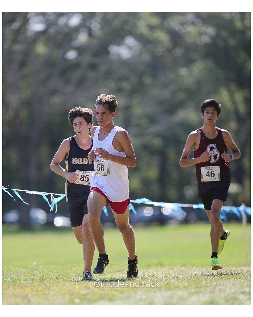 Camden Florio – North Kingstown High School - Mason Hernandez – Londonderry High School- Ashvik Yadav – Groton Dunstable Regional High S - 2025 RI Ocean State XC Invitational - Goddard Memorial Park - Warwick, RI - September 27 2025 File: ./250927-2025-ocean-state-xc-invitational-warwick-ri-454-296A9531.jpg Camden Florio – North Kingstown High School - Mason Hernandez – Londonderry High School- Ashvik Yadav – Groton Dunstable Regional High S -…