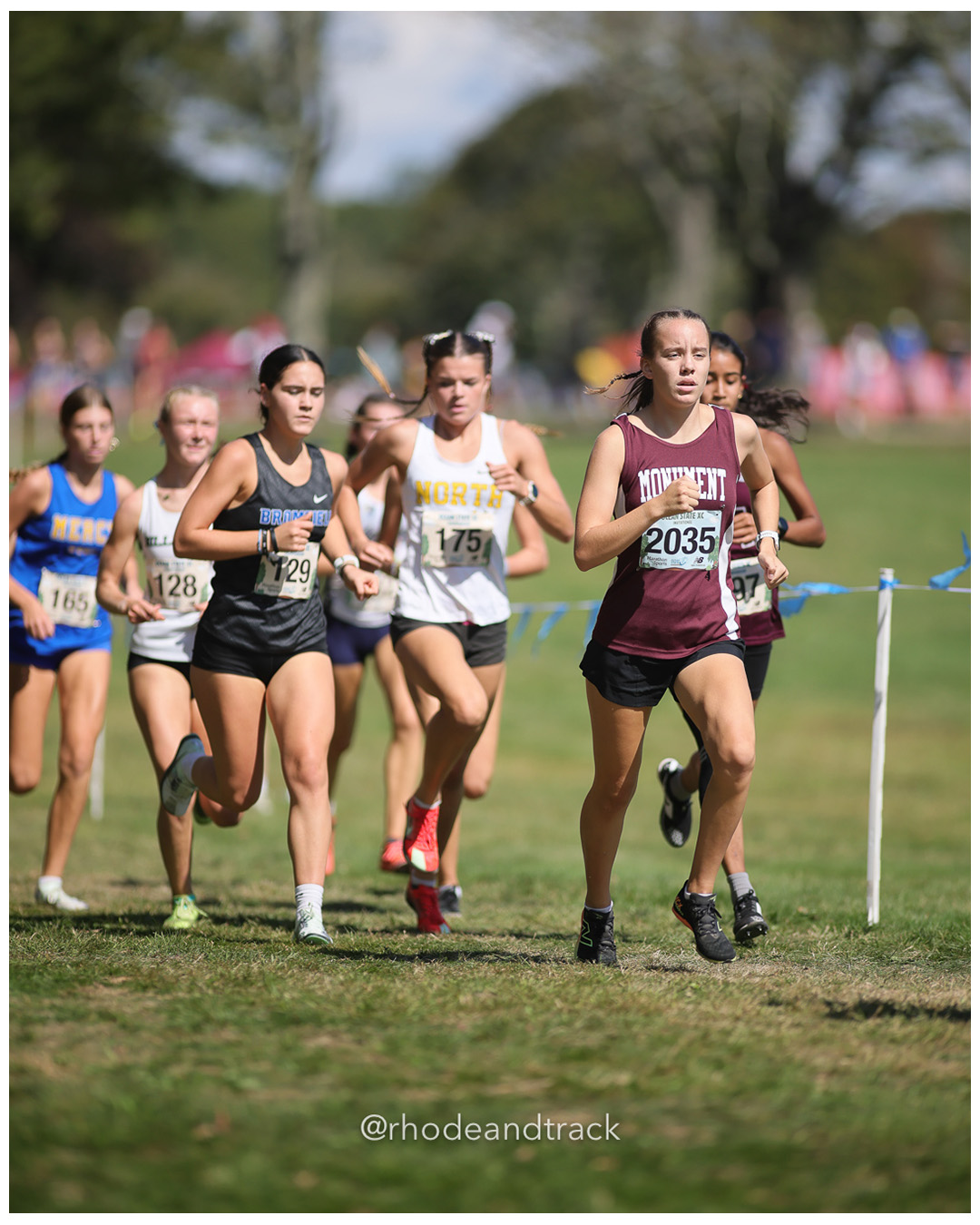 Rosie Bradley – Bromfield School - Abigail Nicolopoulos – North Kingstown High School - 2025 RI Ocean State XC Invitational - Goddard Memorial Park - Warwick, RI - September 27 2025 File: ./250927-2025-ocean-state-xc-invitational-warwick-ri-489-296A9829.jpg Rosie Bradley – Bromfield School - Abigail Nicolopoulos – North Kingstown High School - 2025 RI Ocean State XC Invitational - Goddard Memor…