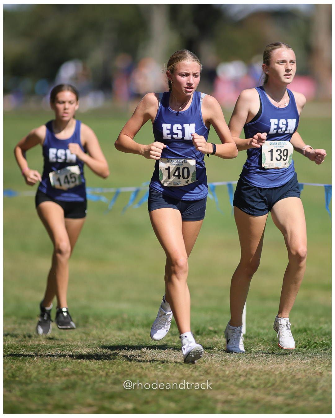 Sterling Furman – Eastport-South Manor - Meghan Burst – Eastport-South Manor - 2025 RI Ocean State XC Invitational - Goddard Memorial Park - Warwick, RI - September 27 2025 File: ./250927-2025-ocean-state-xc-invitational-warwick-ri-517-296A9979.jpg Sterling Furman – Eastport-South Manor - Meghan Burst – Eastport-South Manor - 2025 RI Ocean State XC Invitational - Goddard Memorial Park…