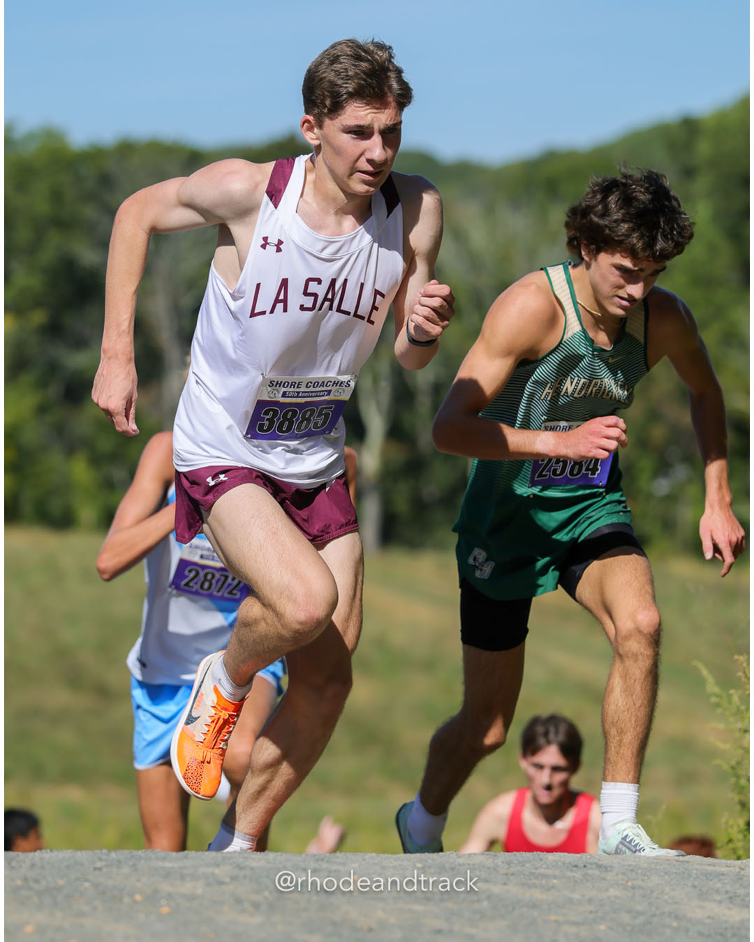 Marshall Vernon - La Salle Academy - 15:42 - Colby Bishop Flynn - Bishop Hendricken - 15:48 - Boys Varsity A - Shore Coach’s Invitational - Varsity A race - Holmdel Park - Holmdel, NJ - October 4, 2025 File: ./dir-Boys-Varsity-A/251004-shore-invitational-holmdel-nj-october-4-2025-367-296A5202.jpg Marshall Vernon - La Salle Academy - 15:42 - Colby Bishop Flynn - Bishop Hendricken - 15:48 - Boys Varsity A - Shore Coach’s Invitational -…