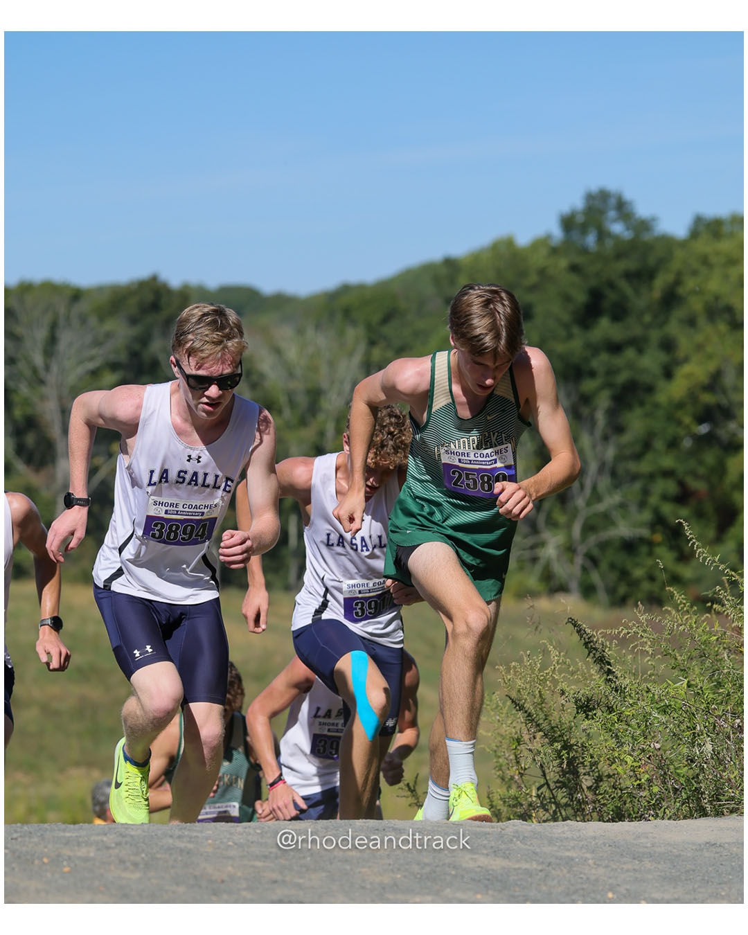 Ben DiCola - La Salle College 12 - 16:39 - Nico Bishop Lepore - Bishop Hendricken - 13:12 - Boys Varsity A - Shore Coach’s Invitational - Varsity A race - Holmdel Park - Holmdel, NJ - October 4, 2025 File: ./dir-Boys-Varsity-A/251004-shore-invitational-holmdel-nj-october-4-2025-385-296A5498.jpg Ben DiCola - La Salle College 12 - 16:39 - Nico Bishop Lepore - Bishop Hendricken - 13:12 - Boys Varsity A - Shore Coach’s Invitational - V…