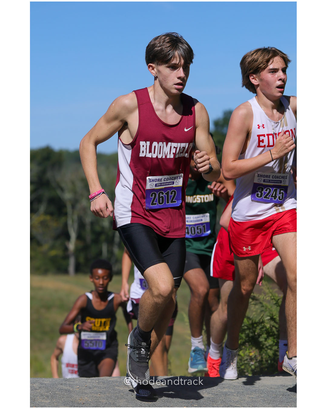 Jon Zeqa - Bloomfield HS - 18:38 - Nikolao Schneider - Edison HS - 18:18 - Boys Varsity A - Shore Coach’s Invitational - Varsity A race - Holmdel Park - Holmdel, NJ - October 4, 2025 File: ./dir-Boys-Varsity-A/251004-shore-invitational-holmdel-nj-october-4-2025-442-296A6263.jpg Jon Zeqa - Bloomfield HS - 18:38 - Nikolao Schneider - Edison HS - 18:18 - Boys Varsity A - Shore Coach’s Invitational - Varsity A race - H…