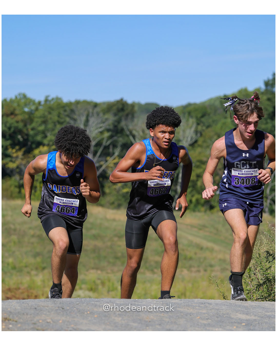 Oliv Lizardo Pena - North Brunswick HS - 21:49 - Devin Hackett - North Brunswick HS - 21:50 - Nick Kleinot - Gloucester C - 21:28 - Boys Varsity A - Shore Coach’s Invitational - Varsity A race - Holmdel Park - Holmdel, NJ - October 4, 2025 File: ./dir-Boys-Varsity-A/251004-shore-invitational-holmdel-nj-october-4-2025-515-296A7211.jpg Oliv Lizardo Pena - North Brunswick HS - 21:49 - Devin Hackett - North Brunswick HS - 21:50 - Nick Kleinot - Gloucester C - 21:28 - Boys Va…